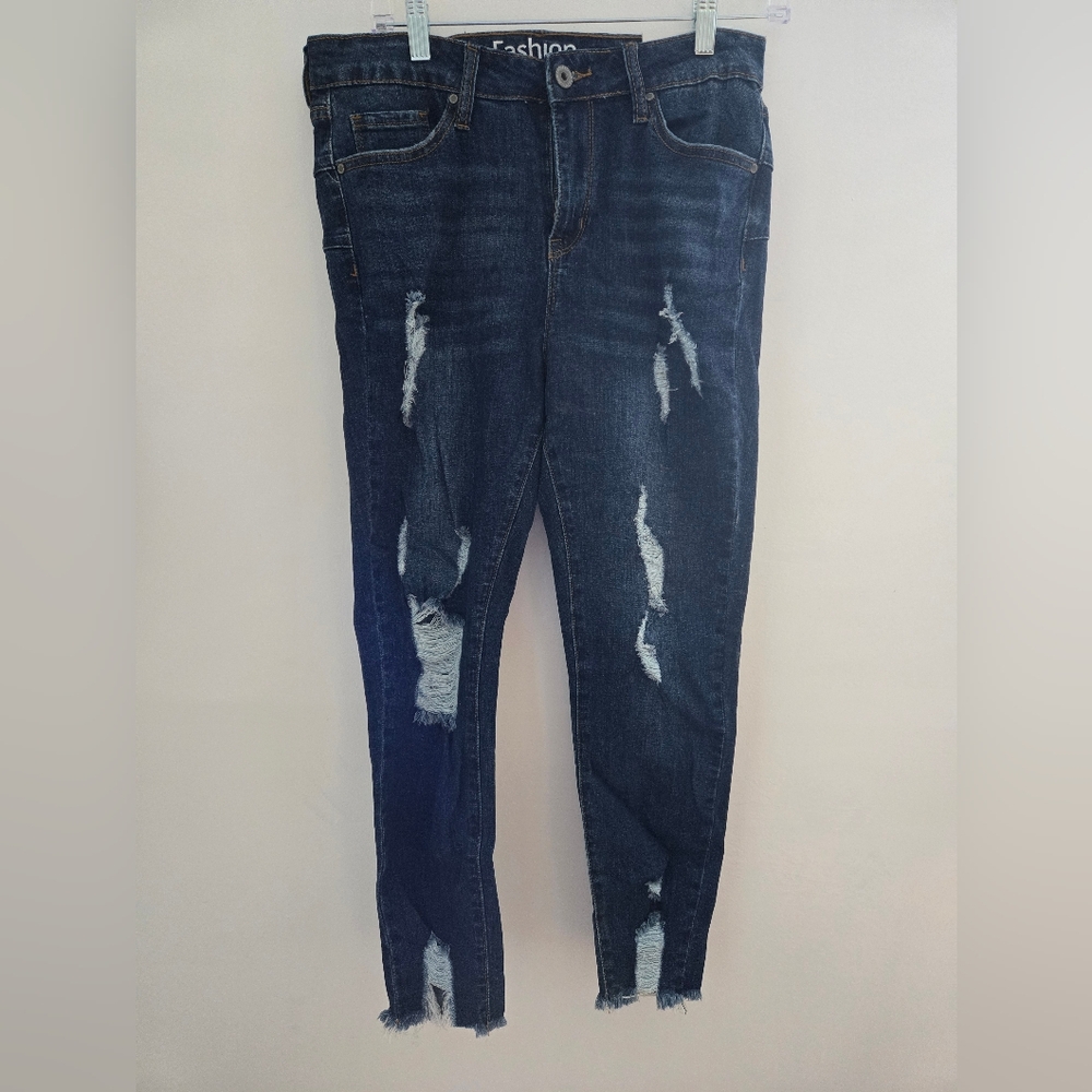 Blue Skinny Jeans with Distressed Detailing